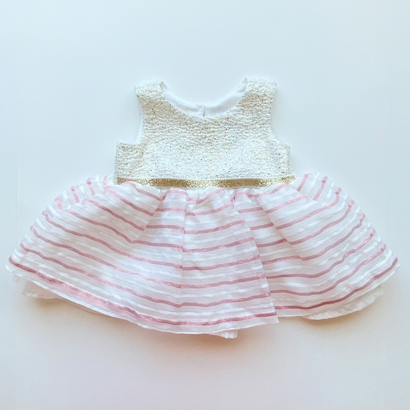The children’s Place sparkly striped dress size 0 to 3 months. Like new.